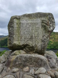 Bruce's Stone located in Loch Trool at Galloway Forest .